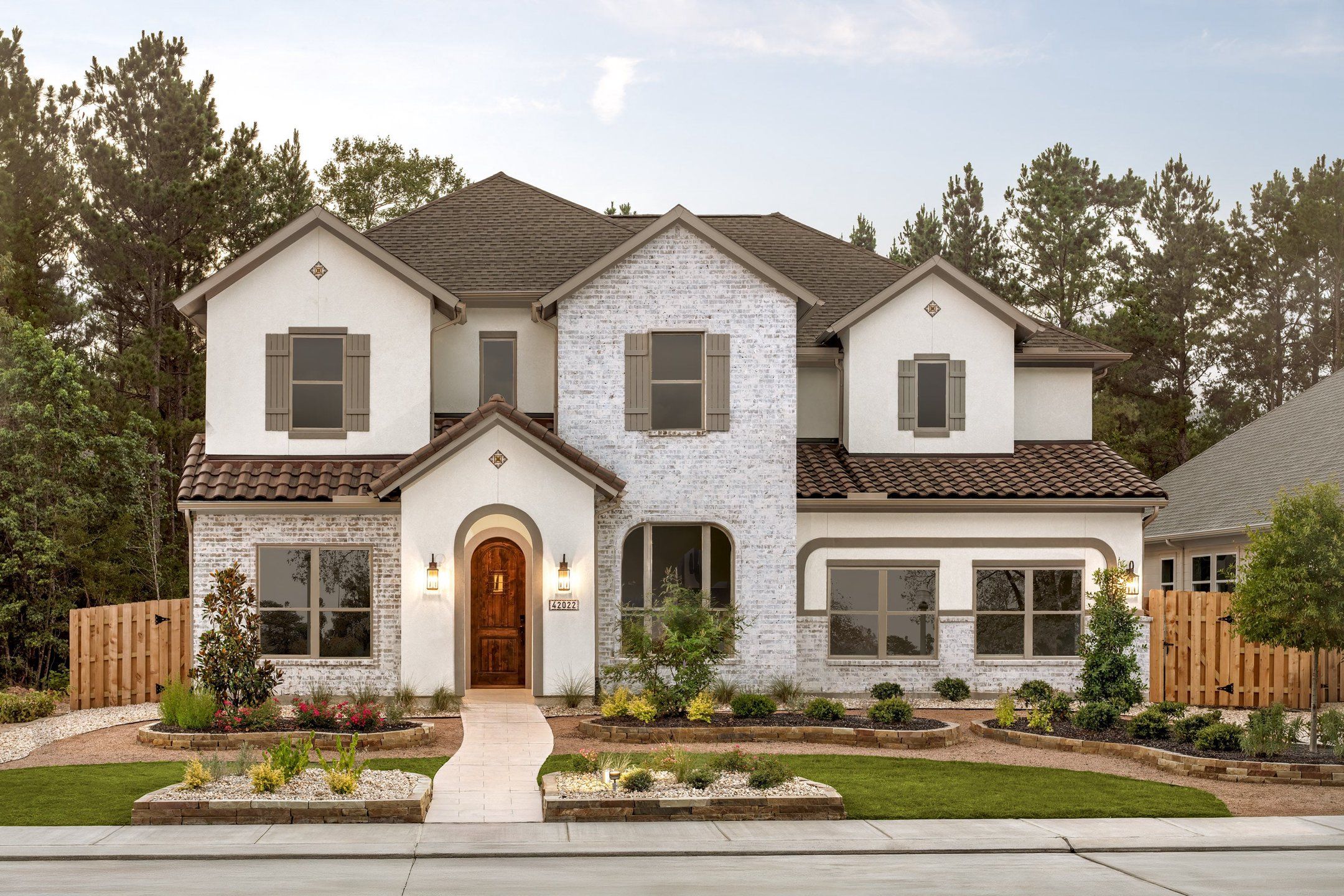 Front exterior of a new home in COLTON, Todd Mission, TX, highlighting curb appeal (Image 1). Front exterior of a new home in COLTON, Todd Mission, TX, highlighting curb appeal (Image 1).