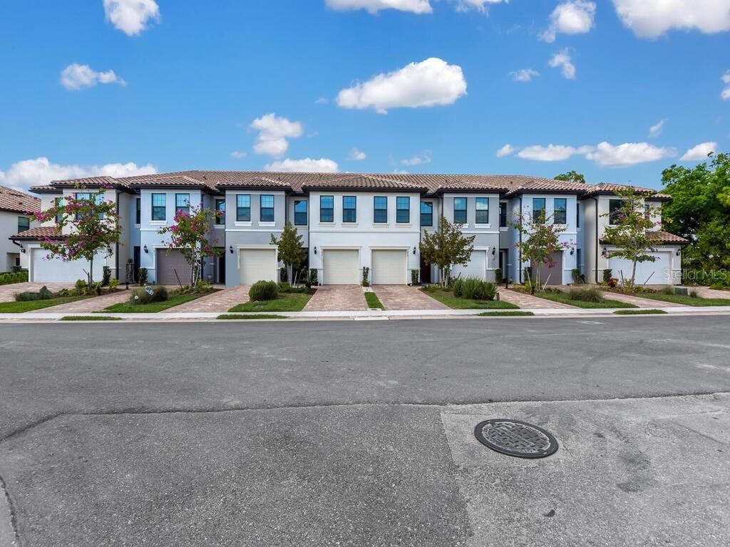 Front exterior of a new home in , Cape Coral, FL, highlighting curb appeal (Image 1). Front exterior of a new home in , Cape Coral, FL, highlighting curb appeal (Image 1).