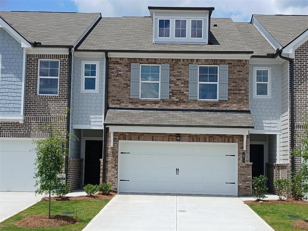 Front exterior of a new home in Union Village, McDonough, GA, highlighting curb appeal (Image 1). Front exterior of a new home in Union Village, McDonough, GA, highlighting curb appeal (Image 1).