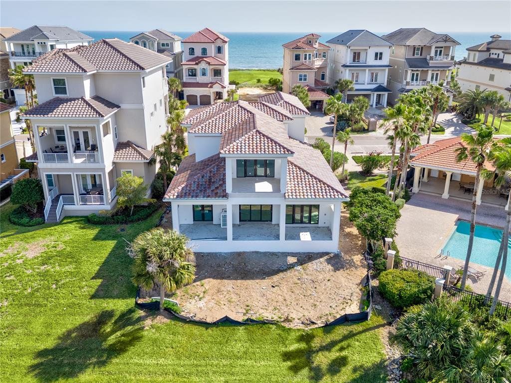 Front exterior of a new home in , Palm Coast, FL, highlighting curb appeal (Image 1). Front exterior of a new home in , Palm Coast, FL, highlighting curb appeal (Image 1).