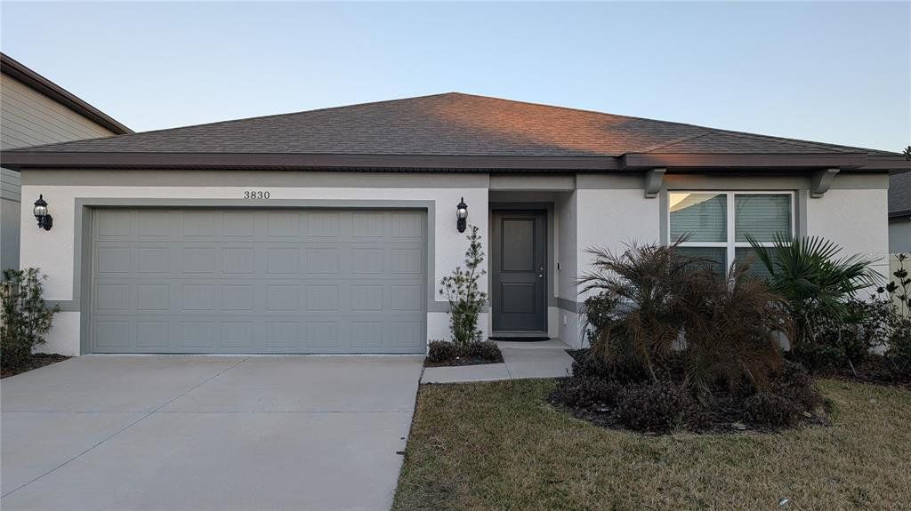 Front exterior of a new home in North Park Isle, Plant City, FL, highlighting curb appeal (Image 1). Front exterior of a new home in North Park Isle, Plant City, FL, highlighting curb appeal (Image 1).