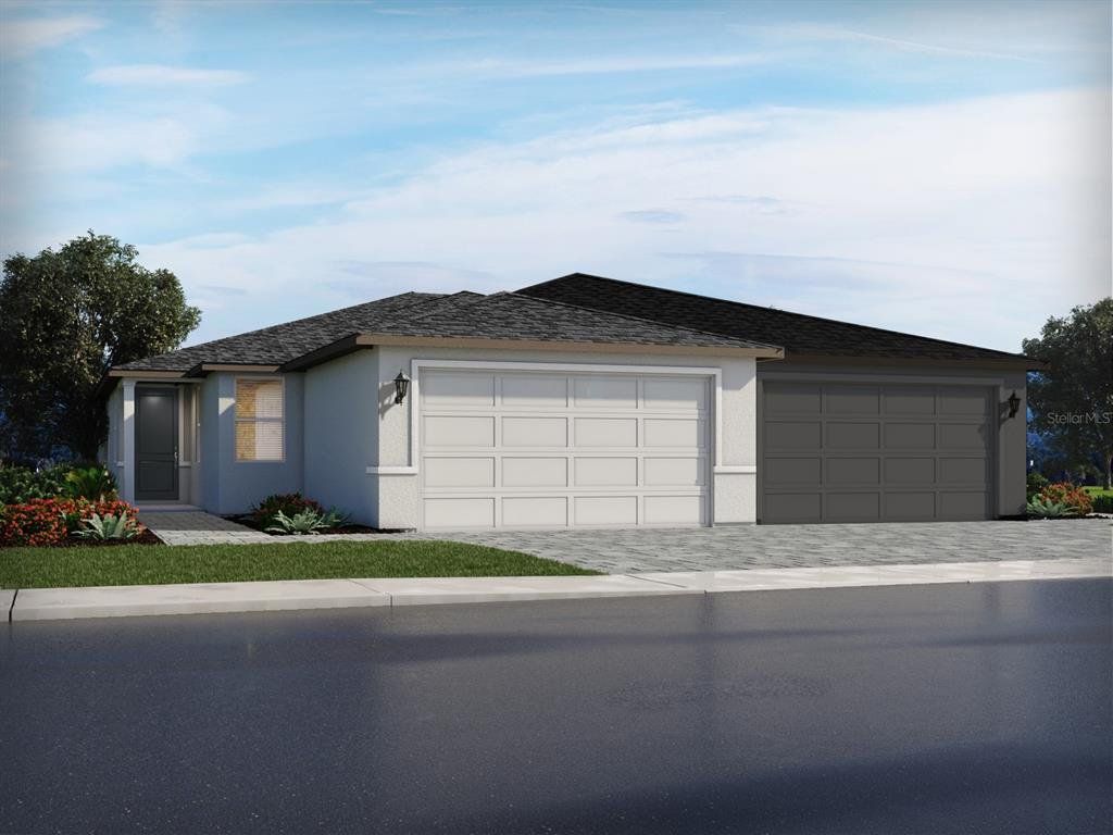 Front exterior of a new home in Ridgehaven - Villas, Ormond Beach, FL, highlighting curb appeal (Image 1). Front exterior of a new home in Ridgehaven - Villas, Ormond Beach, FL, highlighting curb appeal (Image 1).