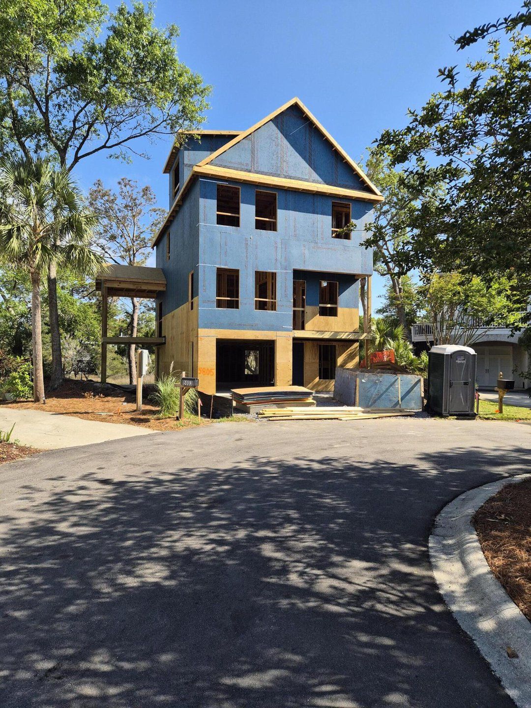 Front exterior of a new home in , Isle Of Palms, SC, highlighting curb appeal (Image 1). Front exterior of a new home in , Isle Of Palms, SC, highlighting curb appeal (Image 1).