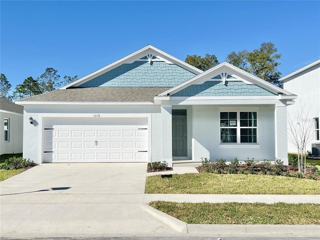 Front exterior of a new home in Fountain View, Ormond Beach, FL, highlighting curb appeal (Image 1). Front exterior of a new home in Fountain View, Ormond Beach, FL, highlighting curb appeal (Image 1).