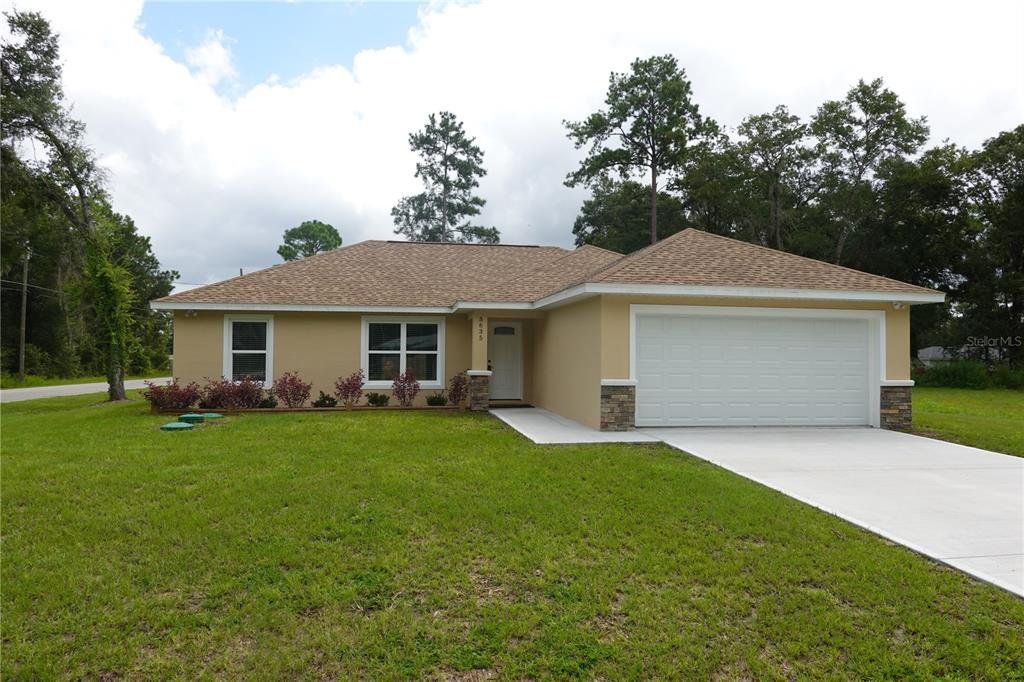 Front exterior of a new home in , Ocala, FL, highlighting curb appeal (Image 1). Front exterior of a new home in , Ocala, FL, highlighting curb appeal (Image 1).