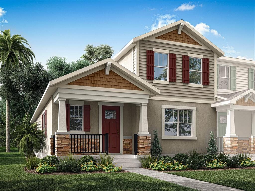 Front exterior of a new home in Hickory Grove, Winter Springs, FL, highlighting curb appeal (Image 1). Front exterior of a new home in Hickory Grove, Winter Springs, FL, highlighting curb appeal (Image 1).