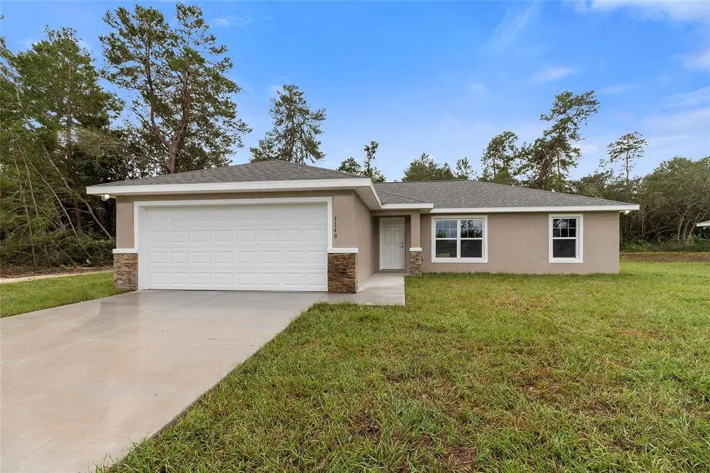 Front exterior of a new home in , Dunnellon, FL, highlighting curb appeal (Image 1). Front exterior of a new home in , Dunnellon, FL, highlighting curb appeal (Image 1).