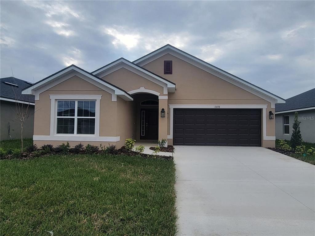Front exterior of a new home in Abbey Glen, Dade City, FL, highlighting curb appeal (Image 1). Front exterior of a new home in Abbey Glen, Dade City, FL, highlighting curb appeal (Image 1).
