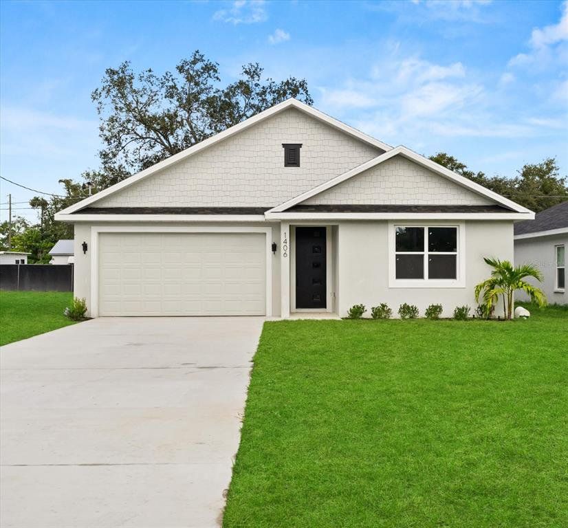 Front exterior of a new home in , Haines City, FL, highlighting curb appeal (Image 1). Front exterior of a new home in , Haines City, FL, highlighting curb appeal (Image 1).