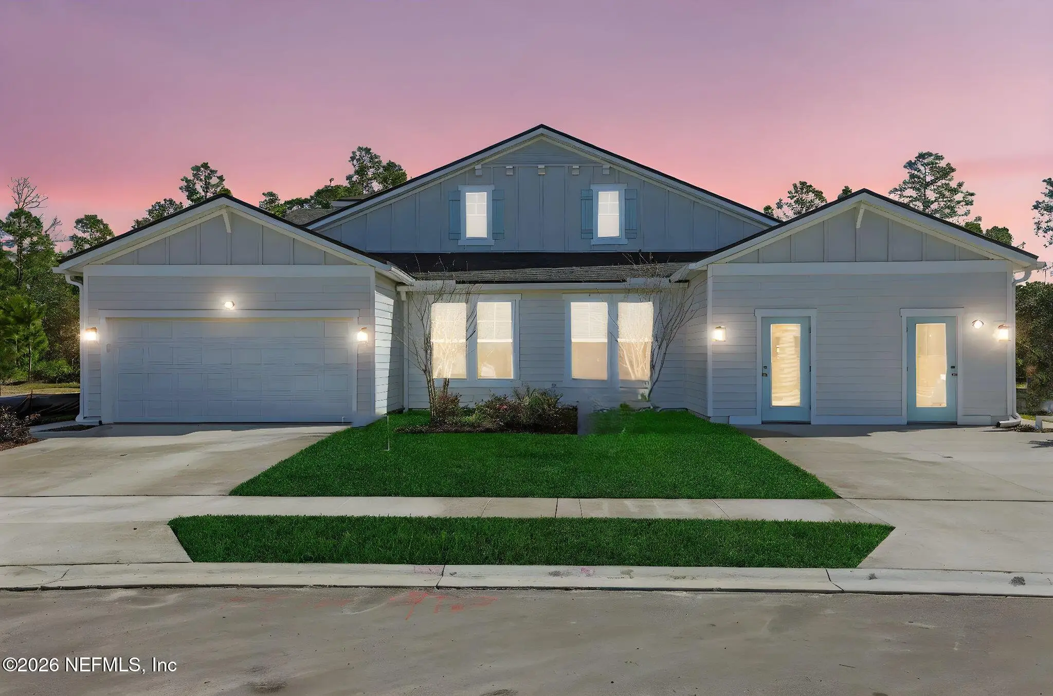 Front exterior of a new home in Seminole Trace, Palm Coast, FL, highlighting curb appeal (Image 1). Front exterior of a new home in Seminole Trace, Palm Coast, FL, highlighting curb appeal (Image 1).