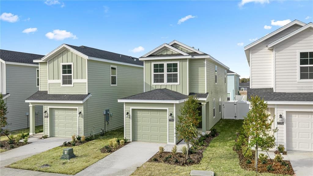 Front exterior of a new home in Pioneer Ranch, Ocala, FL, highlighting curb appeal (Image 1). Front exterior of a new home in Pioneer Ranch, Ocala, FL, highlighting curb appeal (Image 1).