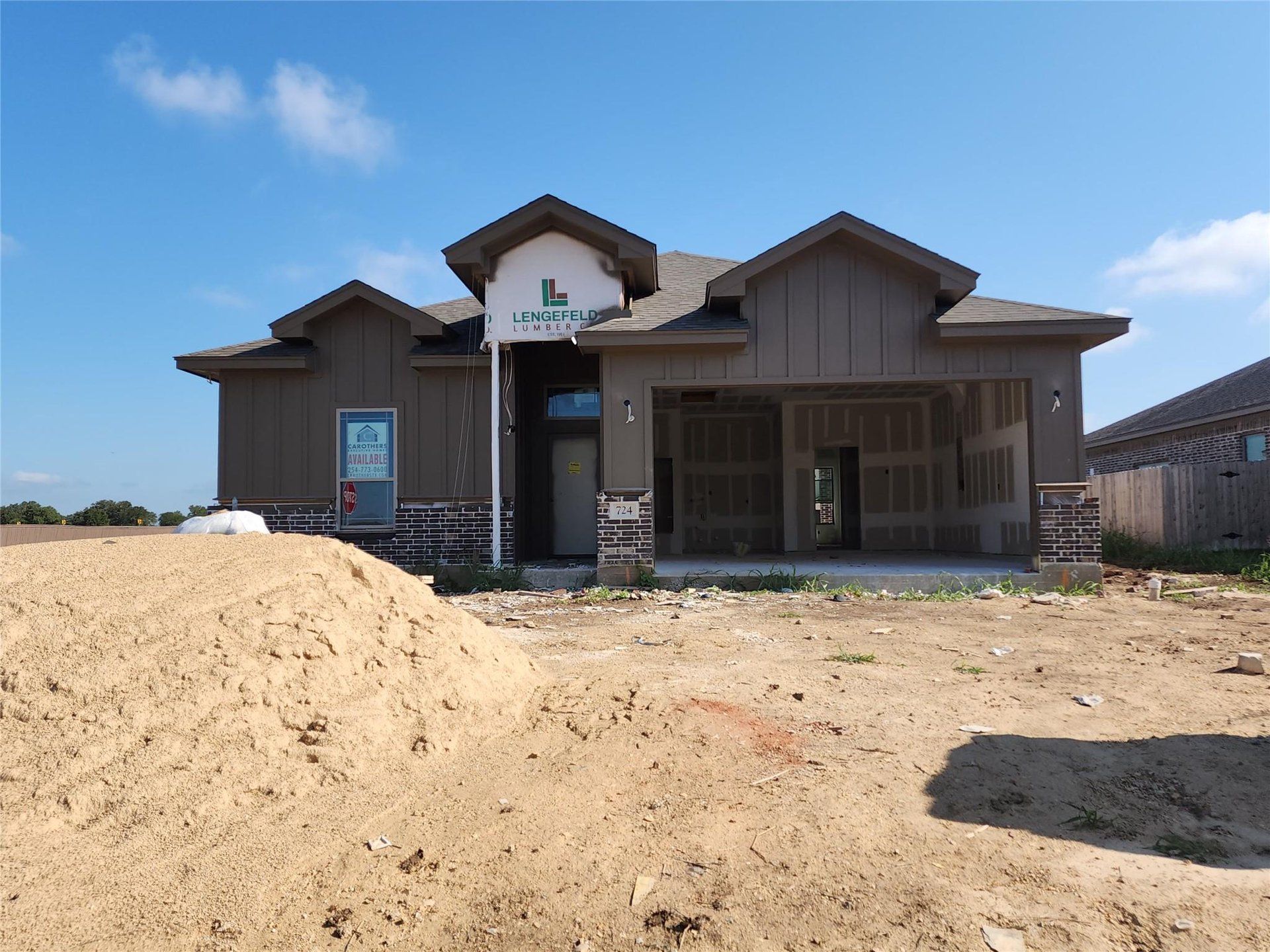 View of front of house featuring board and batten siding View of front of house featuring board and batten siding