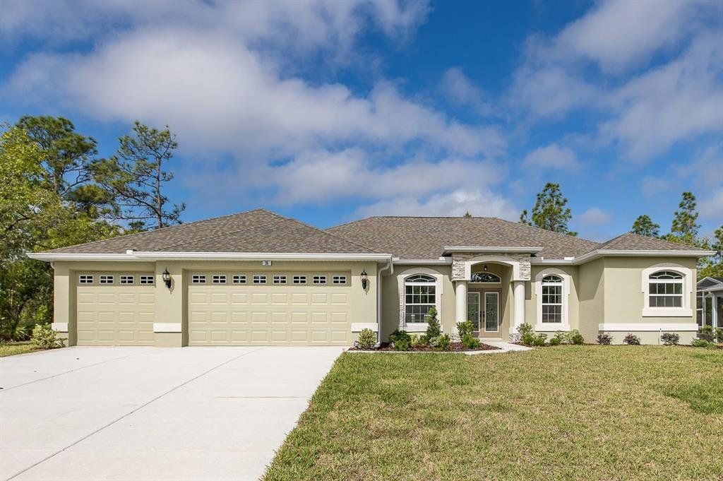 Front exterior of a new home in , Homosassa, FL, highlighting curb appeal (Image 1). Front exterior of a new home in , Homosassa, FL, highlighting curb appeal (Image 1).