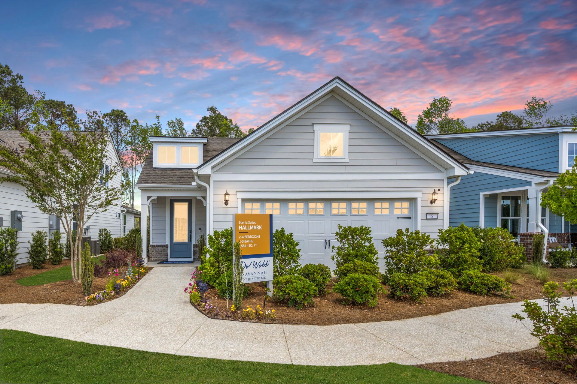Front exterior of a new home in Sun City Hilton Head, Bluffton, SC, highlighting curb appeal (Image 1). Front exterior of a new home in Sun City Hilton Head, Bluffton, SC, highlighting curb appeal (Image 1).