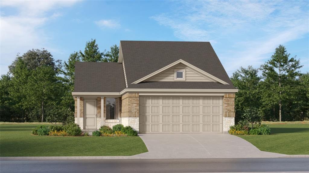 Traditional style residence featuring a two-car garage, brick and stone veneer accents, and a covered front entry Traditional style residence featuring a two-car garage, brick and stone veneer accents, and a covered front entry