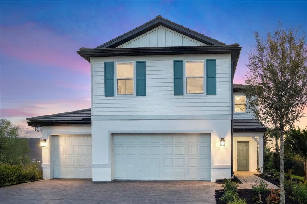 Front exterior of a new home in , Venice, FL, highlighting curb appeal (Image 1). Front exterior of a new home in , Venice, FL, highlighting curb appeal (Image 1).