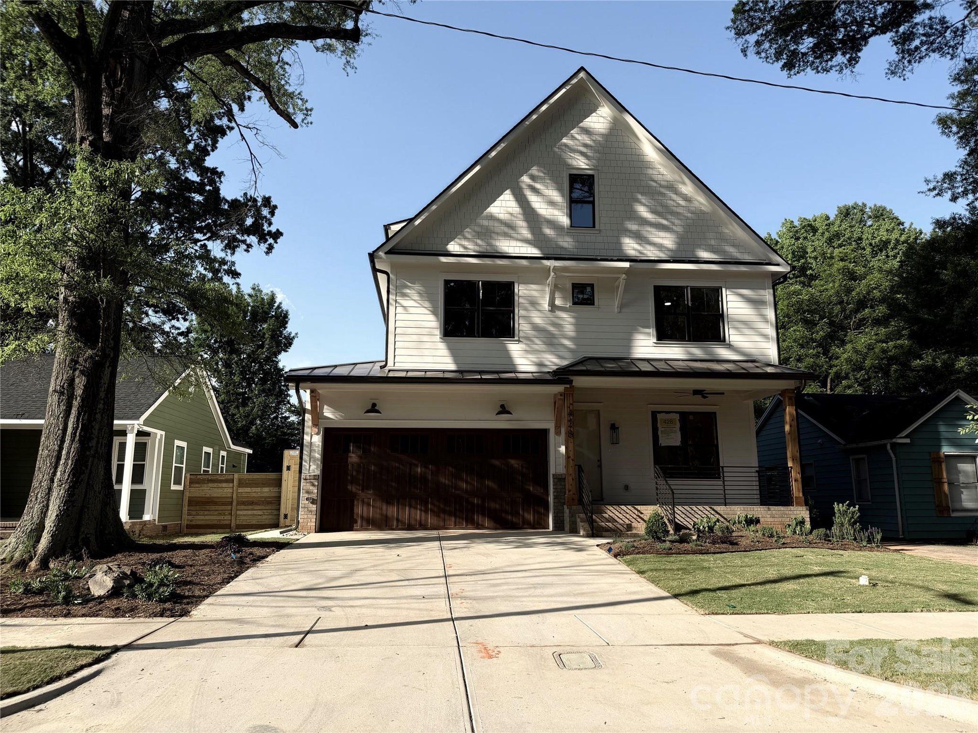Front exterior of a new home in , Charlotte, NC, highlighting curb appeal (Image 1). Front exterior of a new home in , Charlotte, NC, highlighting curb appeal (Image 1).