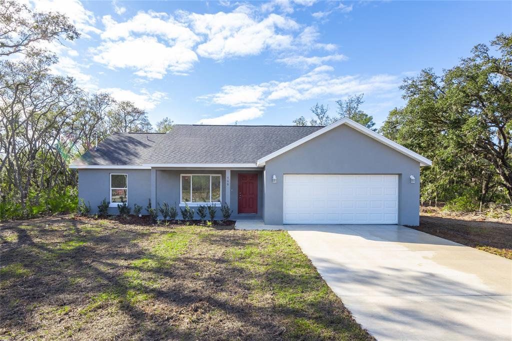 Front exterior of a new home in , Williston, FL, highlighting curb appeal (Image 1). Front exterior of a new home in , Williston, FL, highlighting curb appeal (Image 1).