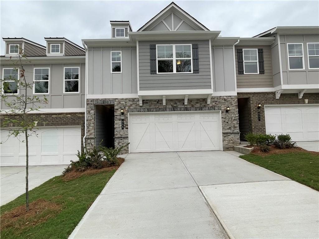 Front exterior of a new home in Porter Reserve, Decatur, GA, highlighting curb appeal (Image 1). Front exterior of a new home in Porter Reserve, Decatur, GA, highlighting curb appeal (Image 1).