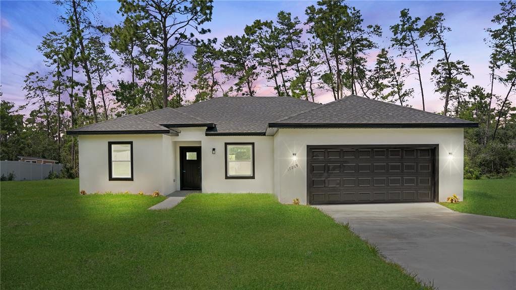 Front exterior of a new home in , Ocala, FL, highlighting curb appeal (Image 1). Front exterior of a new home in , Ocala, FL, highlighting curb appeal (Image 1).