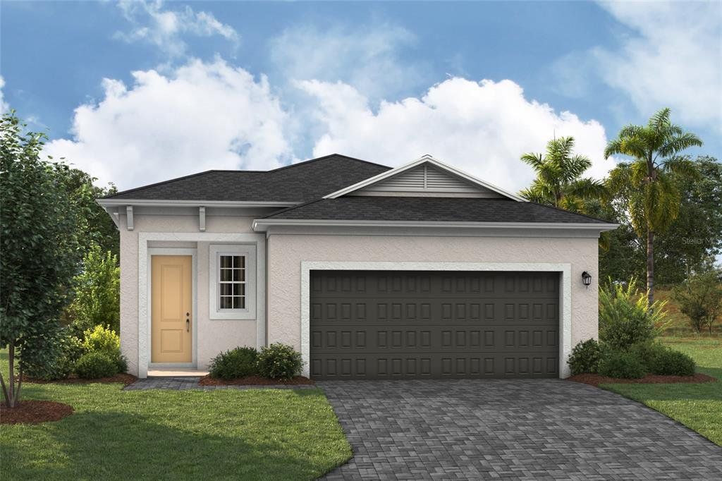 Front exterior of a new home in Cherrywood Preserve, Ocala, FL, highlighting curb appeal (Image 1).
