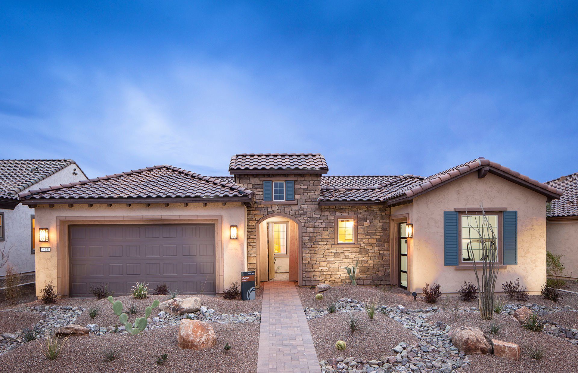 Front exterior of a new home in Sun City Festival, Buckeye, AZ, highlighting curb appeal (Image 1). Front exterior of a new home in Sun City Festival, Buckeye, AZ, highlighting curb appeal (Image 1).