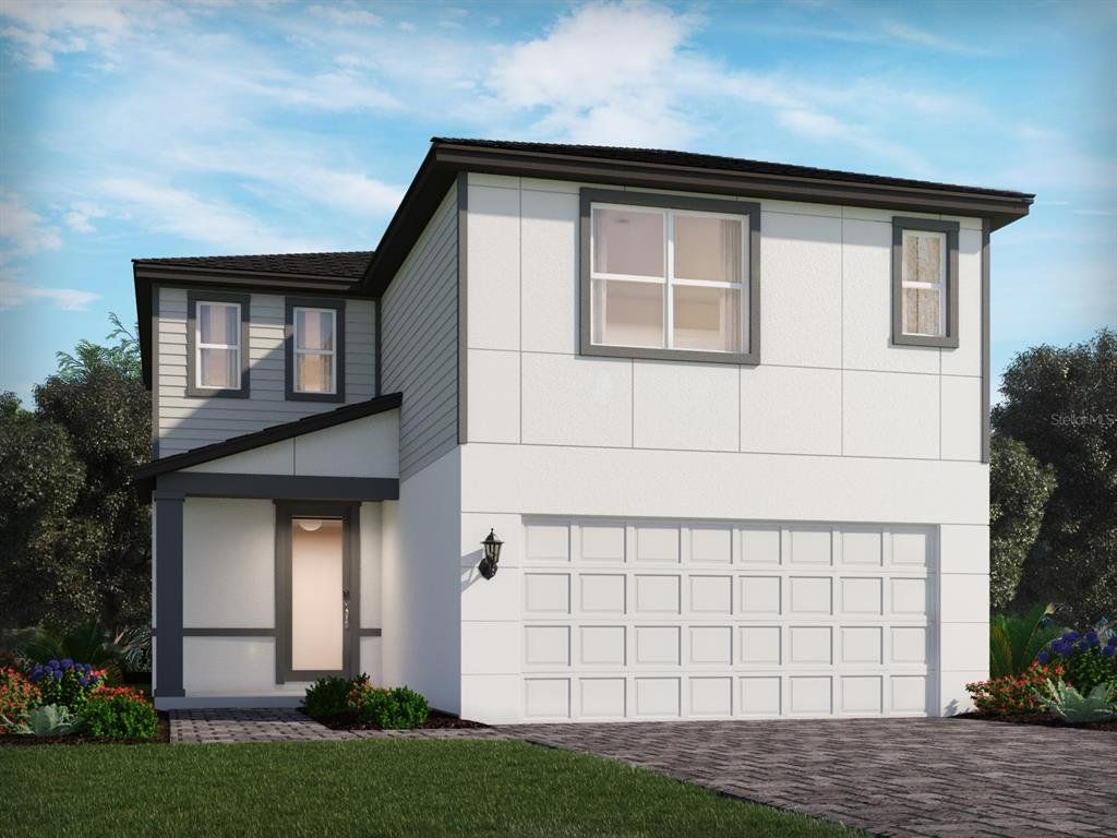 Front exterior of a new home in Wynnstone - Classic Series, Davenport, FL, highlighting curb appeal (Image 1). Front exterior of a new home in Wynnstone - Classic Series, Davenport, FL, highlighting curb appeal (Image 1).