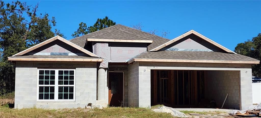 Front exterior of a new home in , Ocala, FL, highlighting curb appeal (Image 1). Front exterior of a new home in , Ocala, FL, highlighting curb appeal (Image 1).