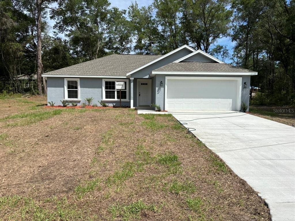 Front exterior of a new home in , Dunnellon, FL, highlighting curb appeal (Image 1). Front exterior of a new home in , Dunnellon, FL, highlighting curb appeal (Image 1).