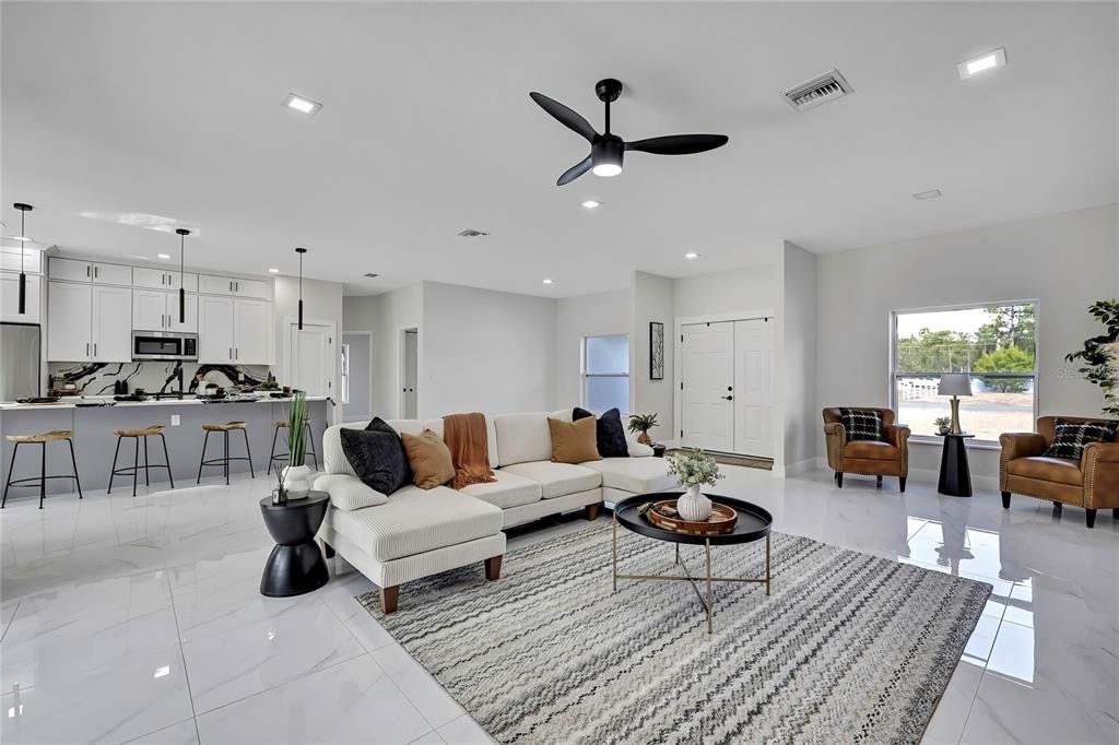 Furnished interior view inside a new home in , Weeki Wachee (Image 1). Furnished interior view inside a new home in , Weeki Wachee (Image 1).