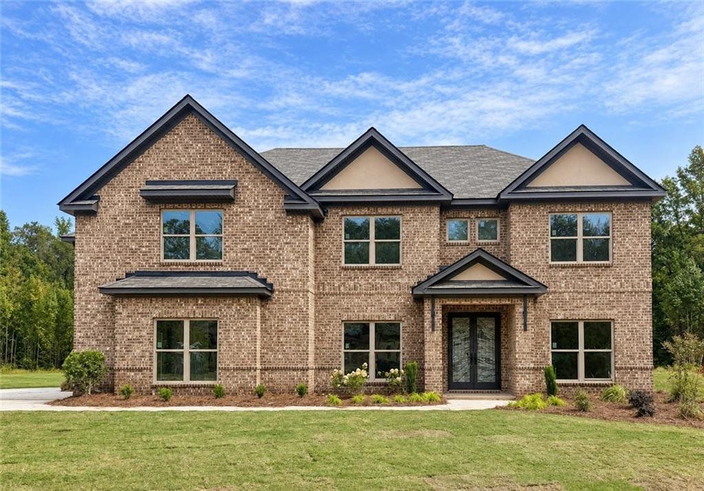 Front exterior of a new home in , Covington, GA, highlighting curb appeal (Image 1). Front exterior of a new home in , Covington, GA, highlighting curb appeal (Image 1).
