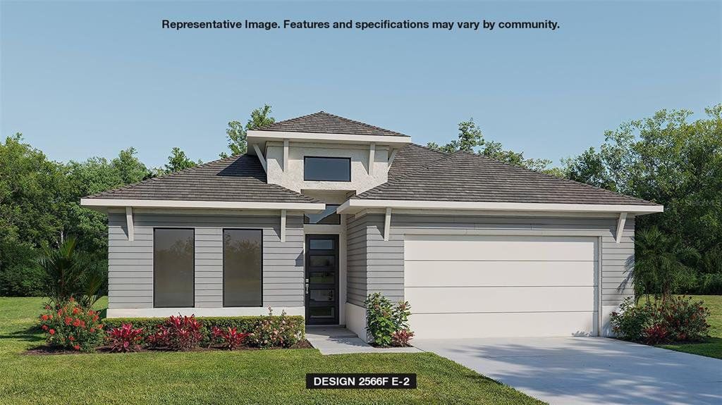 Front exterior of a new home in Magnolia Bay 50', Nokomis, FL, highlighting curb appeal (Image 1).