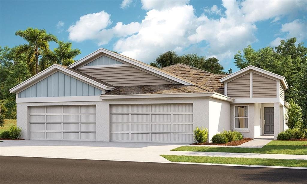 Front exterior of a new home in Crosswind Point, Parrish, FL, highlighting curb appeal (Image 1). Front exterior of a new home in Crosswind Point, Parrish, FL, highlighting curb appeal (Image 1).