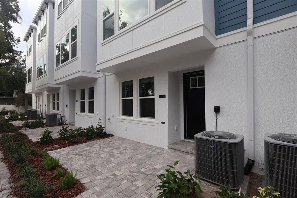 Exterior details and patio area of a home in Apex at Seminole Heights, Tampa (Image 1). Exterior details and patio area of a home in Apex at Seminole Heights, Tampa (Image 1).