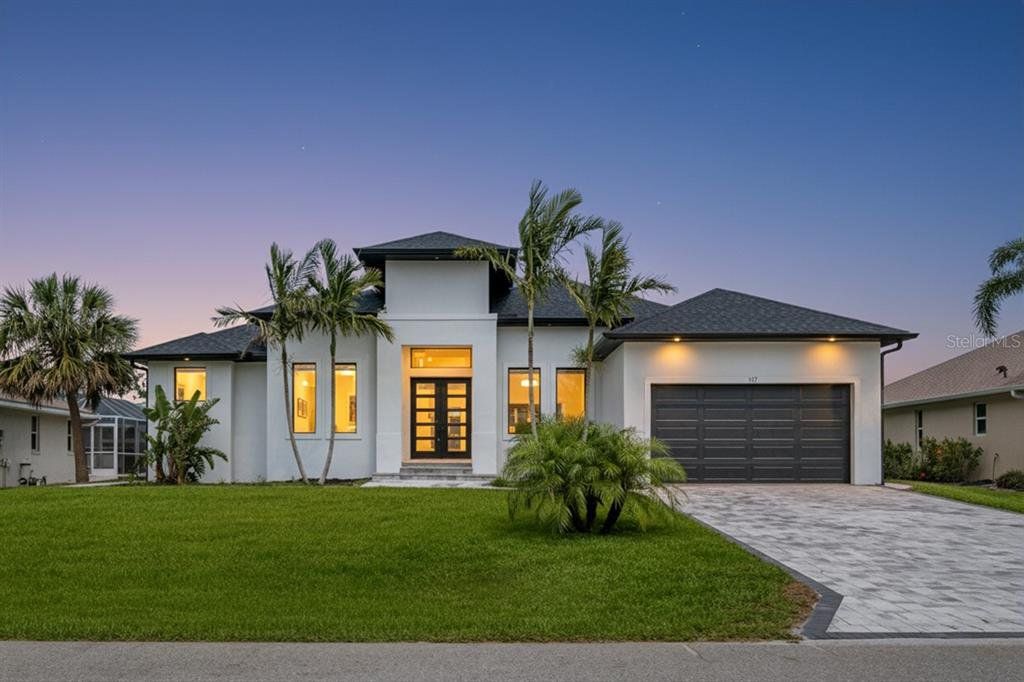 Front exterior of a new home in , Rotonda West, FL, highlighting curb appeal (Image 1). Front exterior of a new home in , Rotonda West, FL, highlighting curb appeal (Image 1).