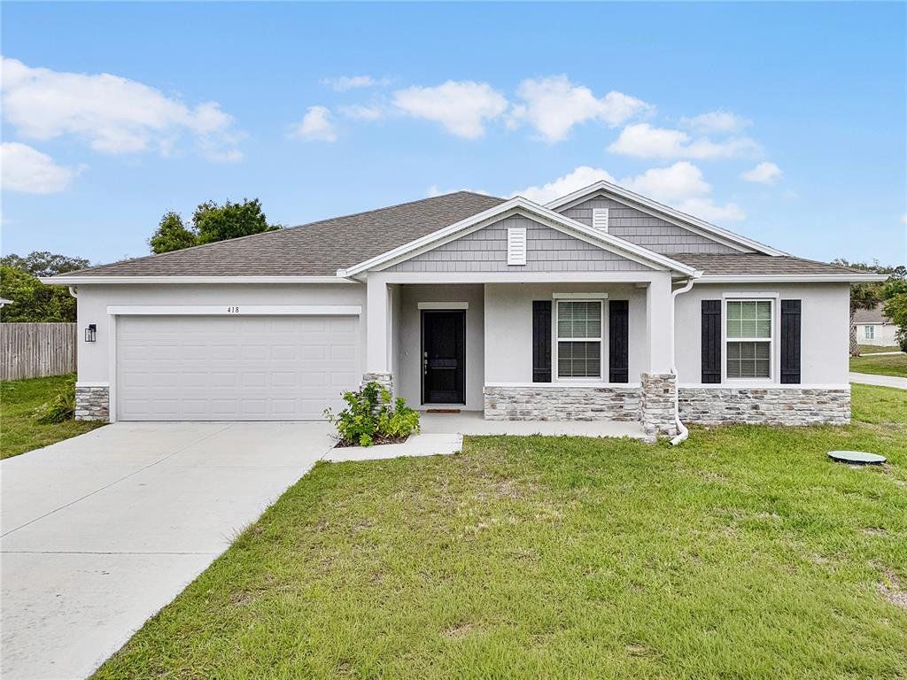 Front exterior of a new home in , Sebastian, FL, highlighting curb appeal (Image 1). Front exterior of a new home in , Sebastian, FL, highlighting curb appeal (Image 1).