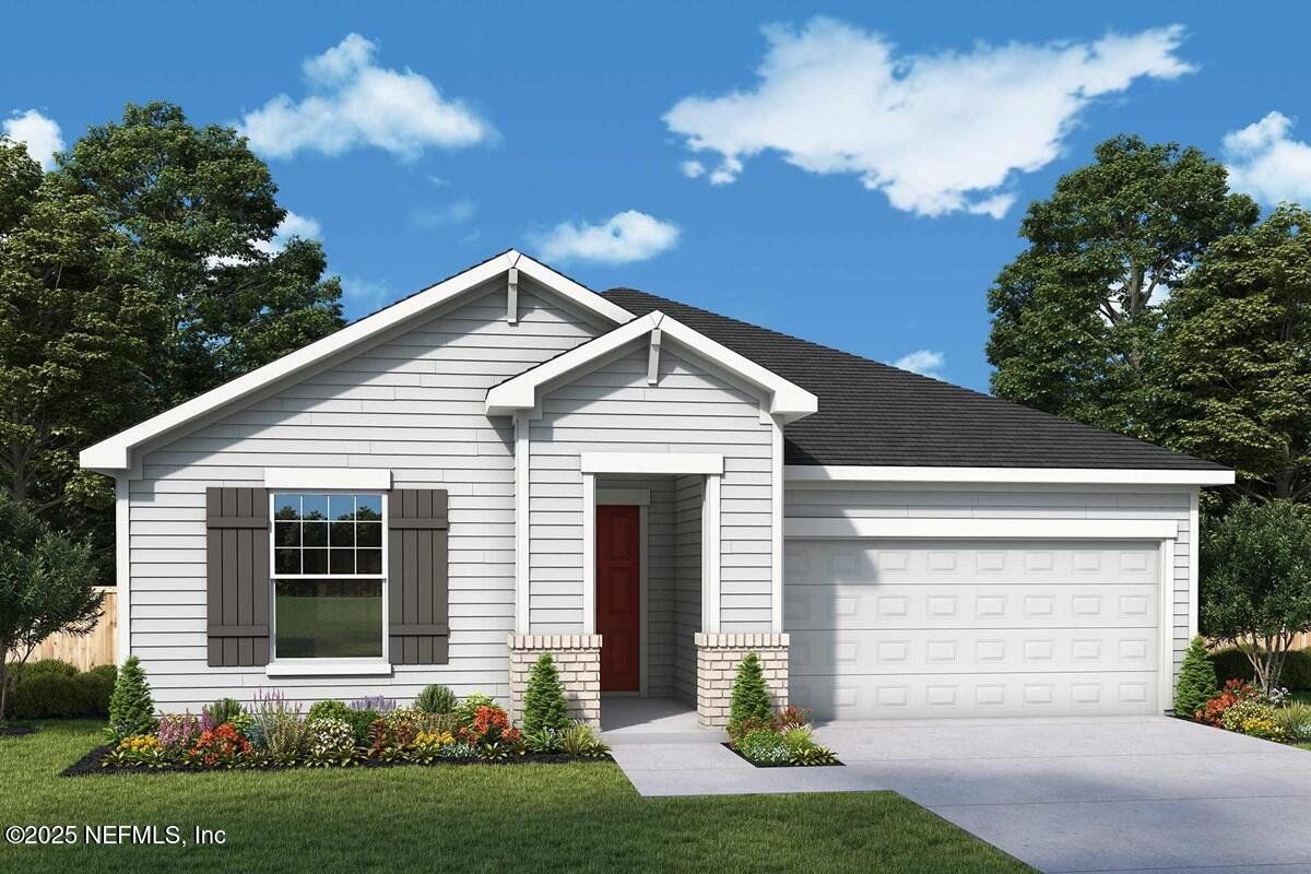 Front exterior of a new home in Tributary 50', Yulee, FL, highlighting curb appeal (Image 1).