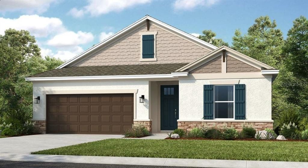 Front exterior of a new home in The Cove at West Port, Port Charlotte, FL, highlighting curb appeal (Image 1).