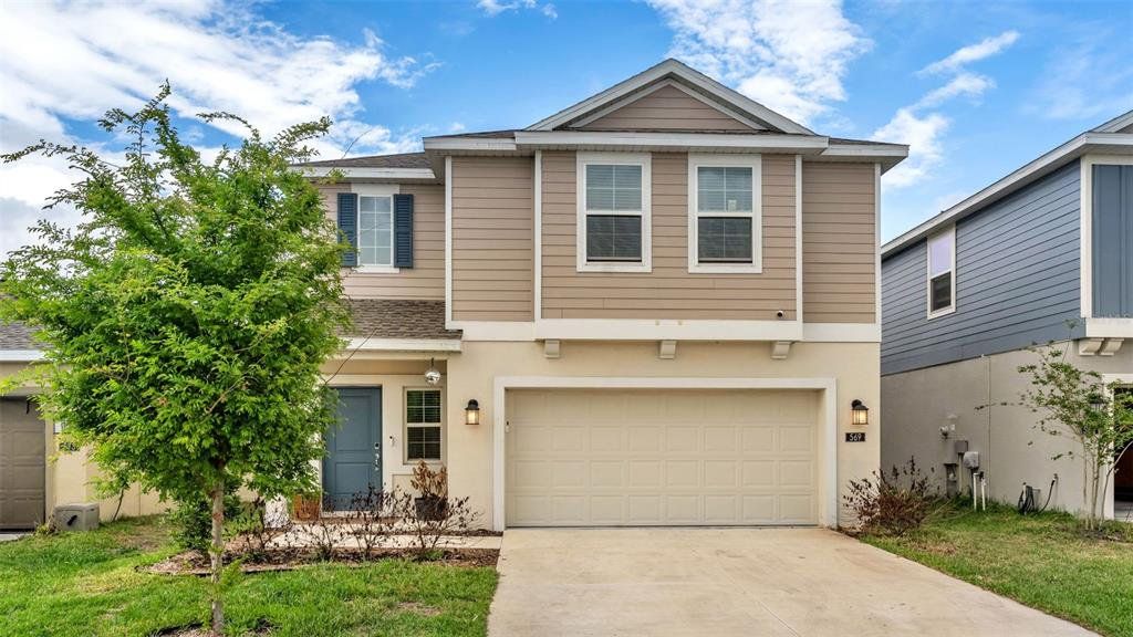 Front exterior of a new home in , Winter Haven, FL, highlighting curb appeal (Image 1). Front exterior of a new home in , Winter Haven, FL, highlighting curb appeal (Image 1).