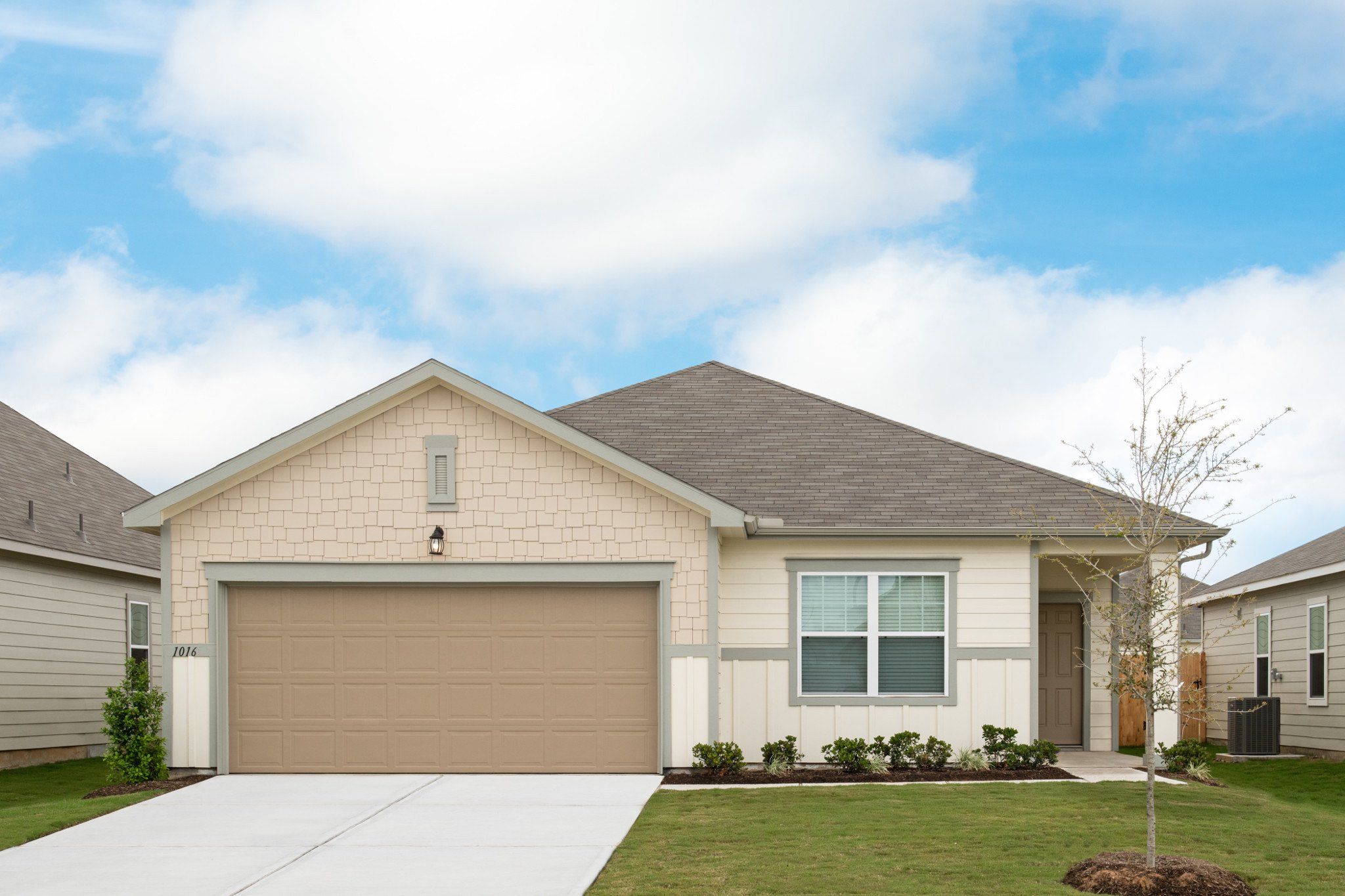 Front exterior of a new home in Cottonwood Creek, San Marcos, TX, highlighting curb appeal (Image 1). Front exterior of a new home in Cottonwood Creek, San Marcos, TX, highlighting curb appeal (Image 1).