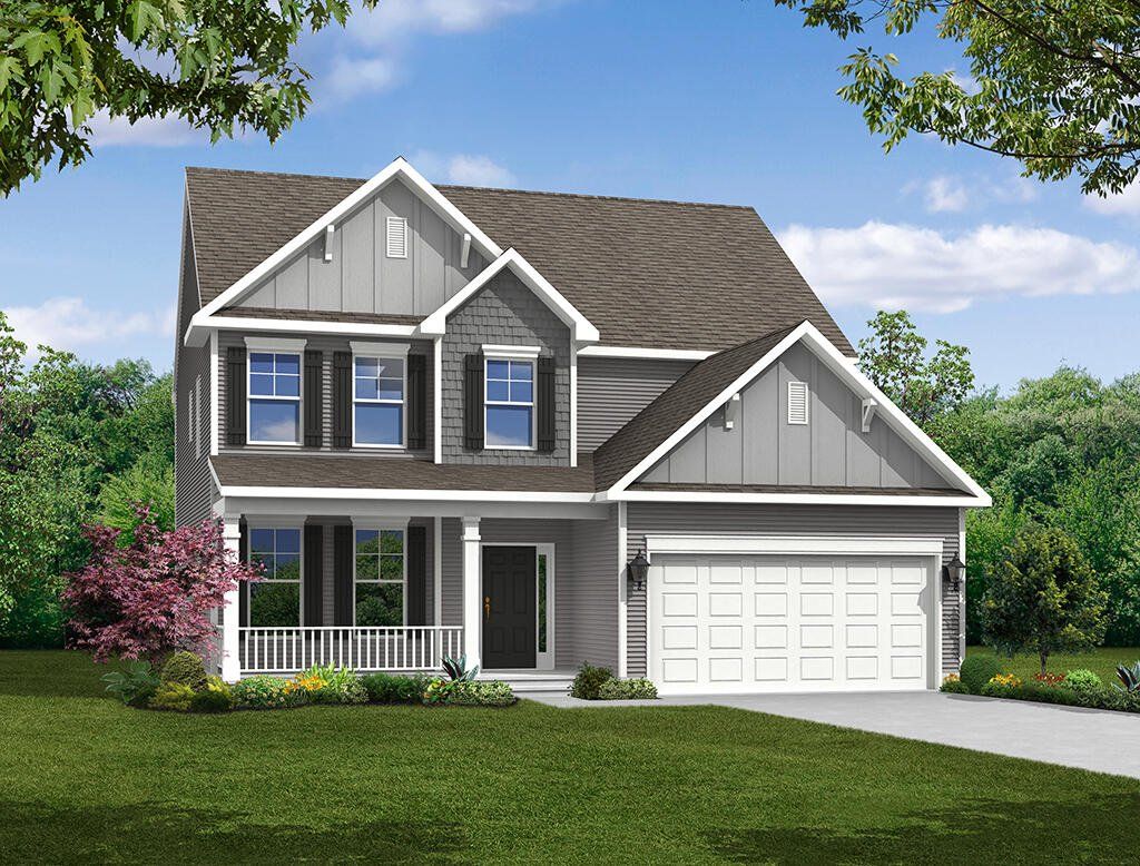 Front exterior of a new home in Oakley Pointe, Moncks Corner, SC, highlighting curb appeal (Image 1).