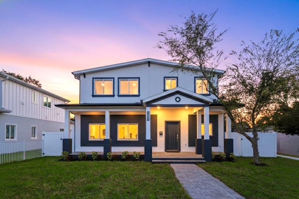 Front exterior of a new home in , St. Petersburg, FL, highlighting curb appeal (Image 1). Front exterior of a new home in , St. Petersburg, FL, highlighting curb appeal (Image 1).