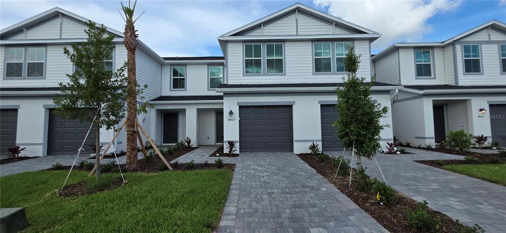 Front exterior of a new home in , Bradenton, FL, highlighting curb appeal (Image 1). Front exterior of a new home in , Bradenton, FL, highlighting curb appeal (Image 1).