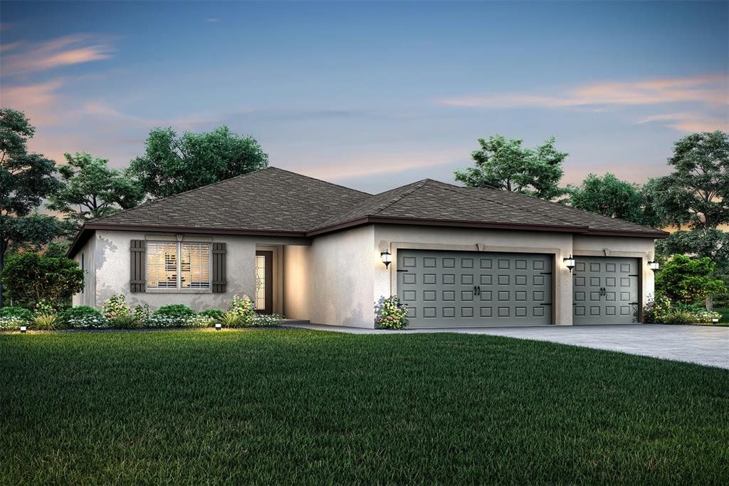 Front exterior of a new home in Citrus Place, Babson Park, FL, highlighting curb appeal (Image 1). Front exterior of a new home in Citrus Place, Babson Park, FL, highlighting curb appeal (Image 1).