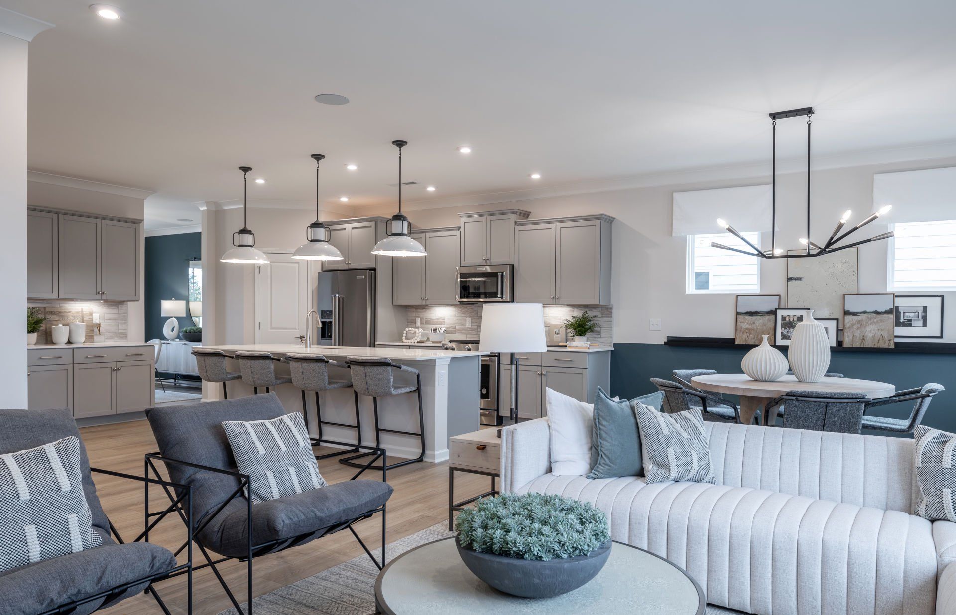 Furnished interior view inside a new home in Stewarts Landing, Charlotte (Image 1).