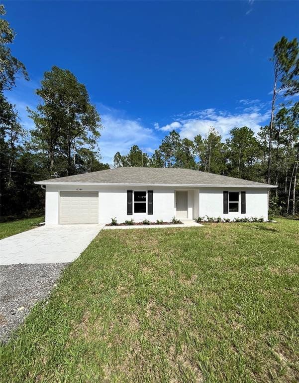 Front exterior of a new home in Flagler Estates, Hastings, FL, highlighting curb appeal (Image 1). Front exterior of a new home in Flagler Estates, Hastings, FL, highlighting curb appeal (Image 1).