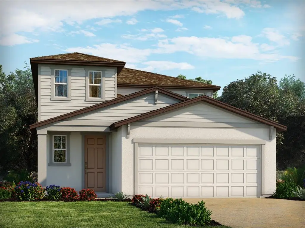 Front exterior of a new home in Bradbury Creek - Classic Series, Haines City, FL, highlighting curb appeal (Image 1).