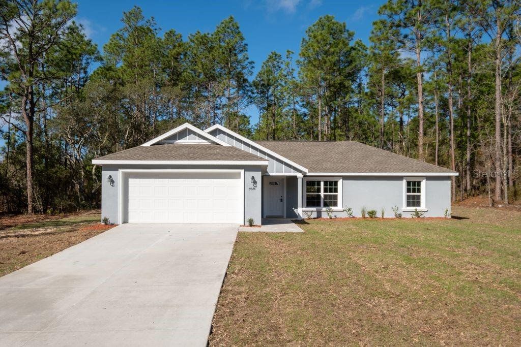 Front exterior of a new home in , Citrus Springs, FL, highlighting curb appeal (Image 1). Front exterior of a new home in , Citrus Springs, FL, highlighting curb appeal (Image 1).