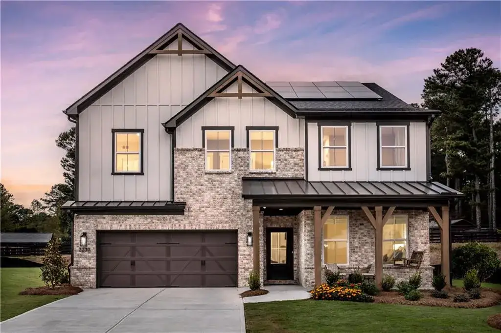 Front exterior of a new home in Wisteria at GreenHouse, Marietta, GA, highlighting curb appeal (Image 1). Front exterior of a new home in Wisteria at GreenHouse, Marietta, GA, highlighting curb appeal (Image 1).