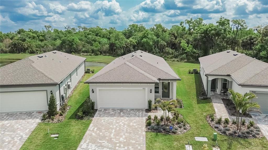 Front exterior of a new home in , Palmetto, FL, highlighting curb appeal (Image 1). Front exterior of a new home in , Palmetto, FL, highlighting curb appeal (Image 1).